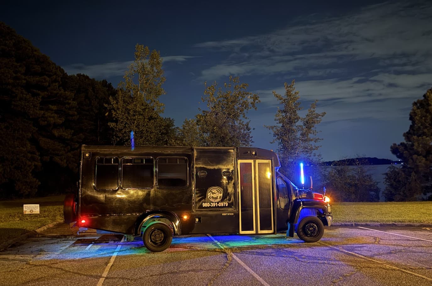 Dale party bus wraparound lounge seating with LED lighting in Charlotte NC