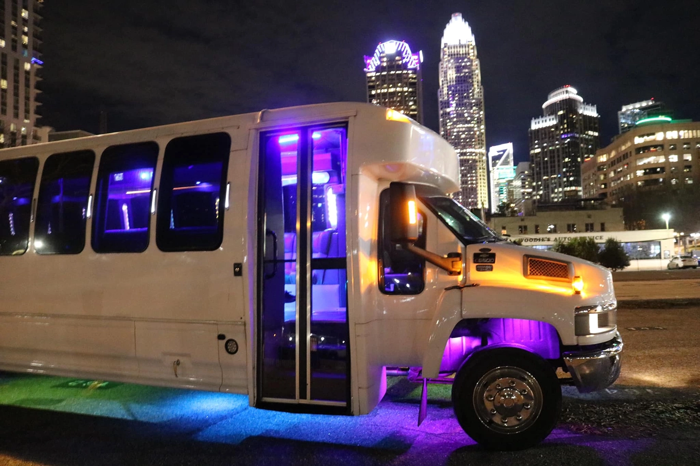 charlotte party bus , reserve a group party bus, white pearl charlotte party bus